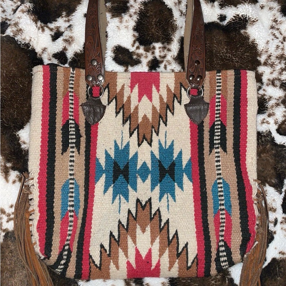 Southwestern saddle blanket tote with leather fringe